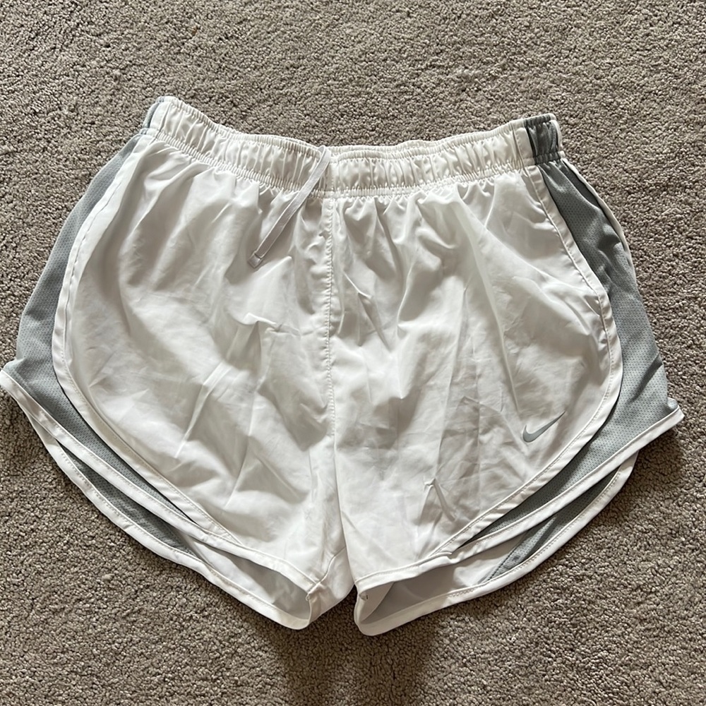 Nike white running shorts with gray side details